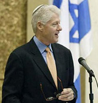 Clinton looks like a modern-orthodox Rabbi wearing a Yarlmulka his bubby knitted for him.