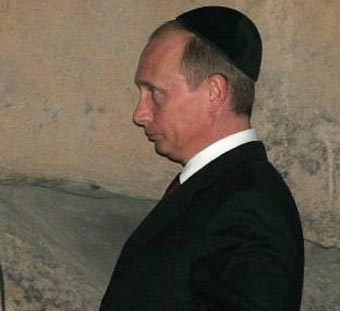Putin looks newly Orthodox. Needs to wear it in a little like a new baseball glove. 